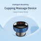 Electric cupping massage device with blue base and black top, red LED indicator on