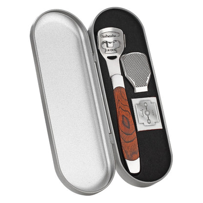 Pedicure callus remover tool set in open metal case with wooden-handled blade and scrubber