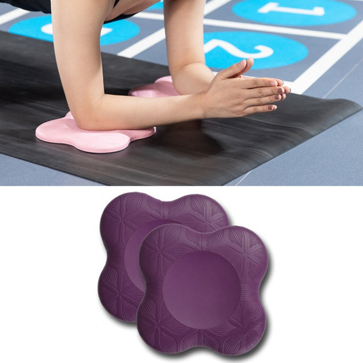 Pair of purple flat yoga elbow and knee pads with textured swirl grip surface