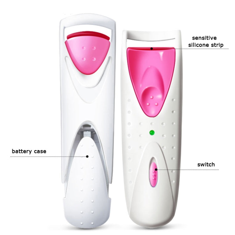 Electric heated eyelash curler with pink silicone strip and switch on white body