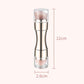 Rose gold retractable makeup brush with rounded bristles and clear retractable sleeve