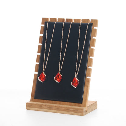 Bamboo jewelry storage display stand with black felt panel and three necklace hooks