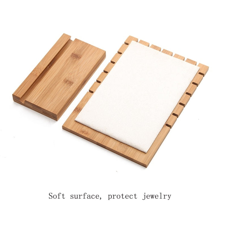 Bamboo jewelry display stand with fold-out base and white felt insert