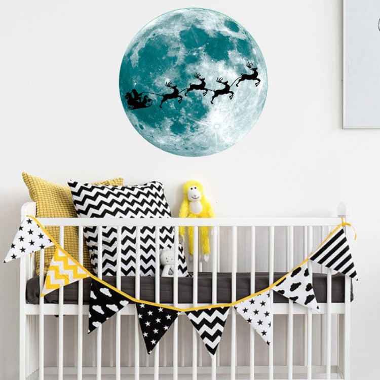 Fluorescent green moon wall sticker with reindeer silhouettes in a flight line