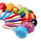 Colorful sand hammers with wooden handles and decorative patterned heads
