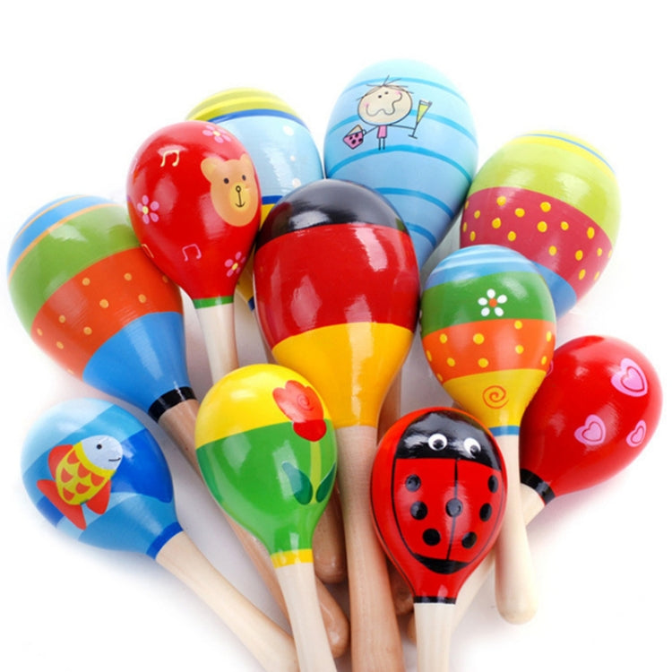 Colorful sand hammers with animal and smiley designs on wooden handles