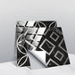 Geometric wall sticker set with black and white angular pattern tiles