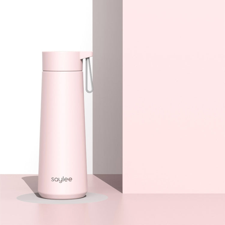 Light pink stainless steel portable thermos cup with carry loop and flip-top lid