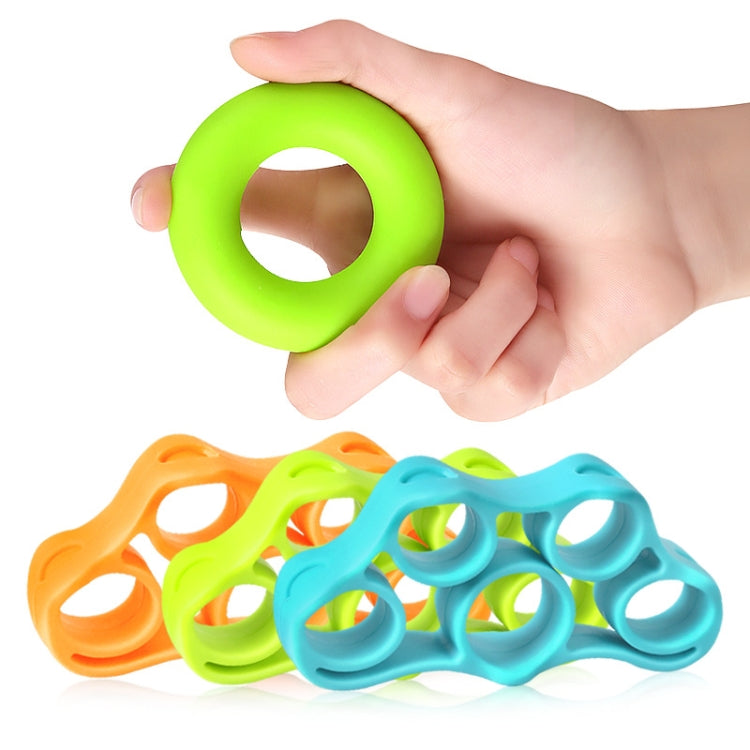 Green silicone finger grip ring in hand with blue, orange, and green grips beside it.