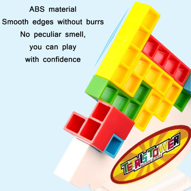 Close-up of multicolor plastic building blocks on a white game stand base