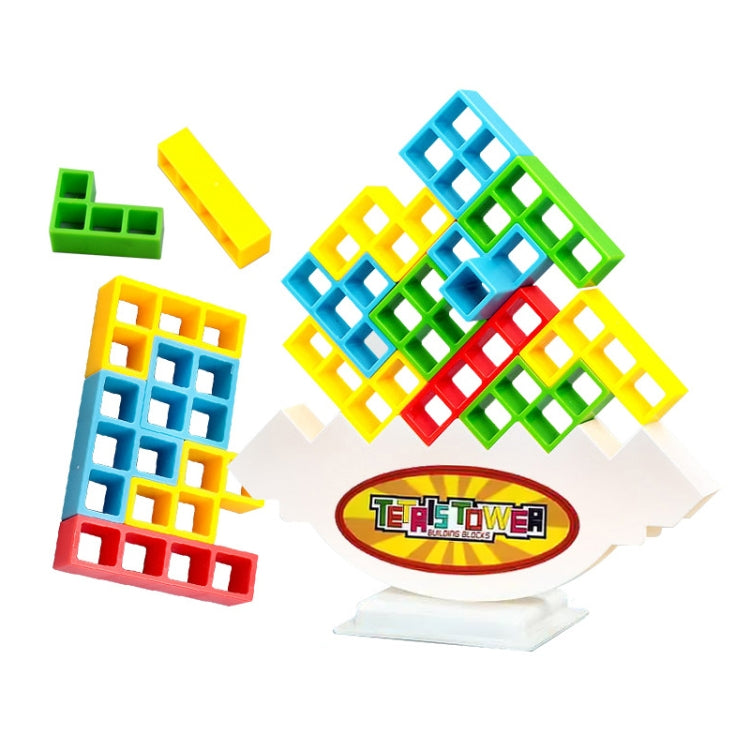 Assorted multicolor building blocks near a white stand base with game logo