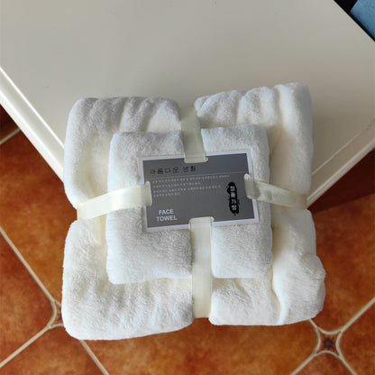 White coral fleece bath towel set, folded bundle with fabric strap ties