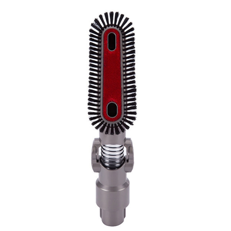 Upright vacuum brush head with black bristles, red center pad, spring neck