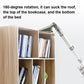 Vacuum attachment with corner brush reaching into a wooden bookshelf