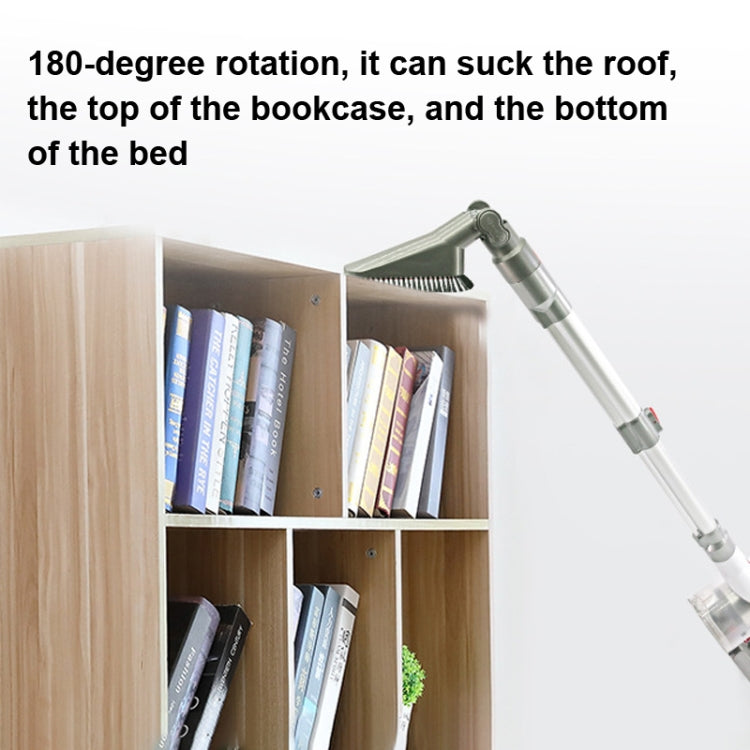Vacuum attachment with corner brush reaching into a wooden bookshelf