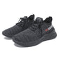 Black knit low-top sneakers, front view with lace-up closure and side logo