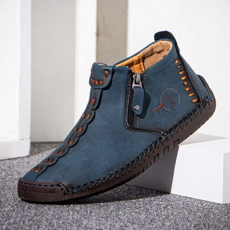 Men's casual ankle boots in blue suede-look with side zipper, buckle strap, and stitched edge