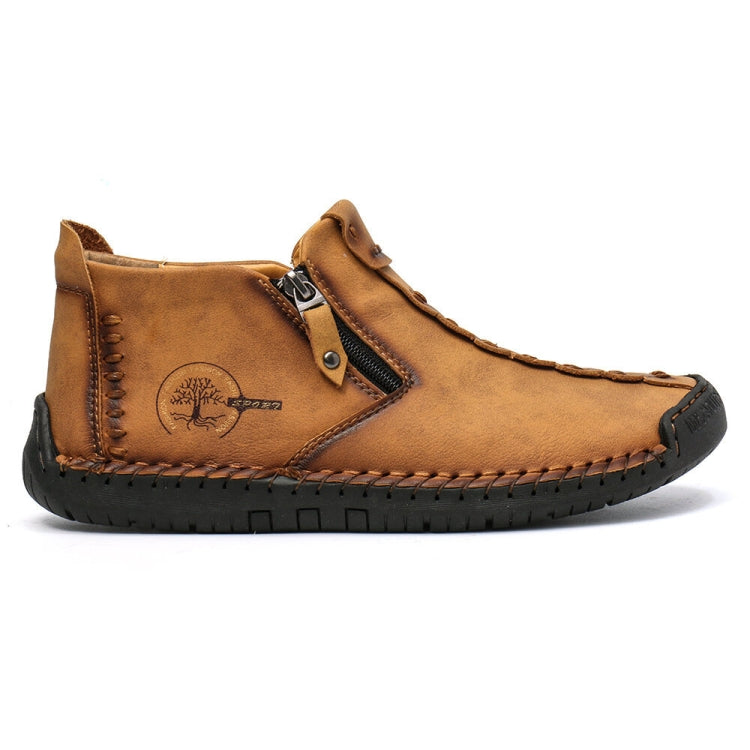 Men's tan leather lace-up boots with side emblem and stitched detailing, thick rubber sole