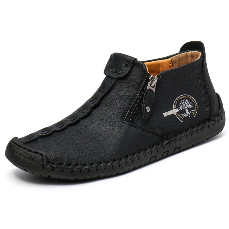 Men’s black leather ankle boots with side zipper, stitched edge trim, and logo patch