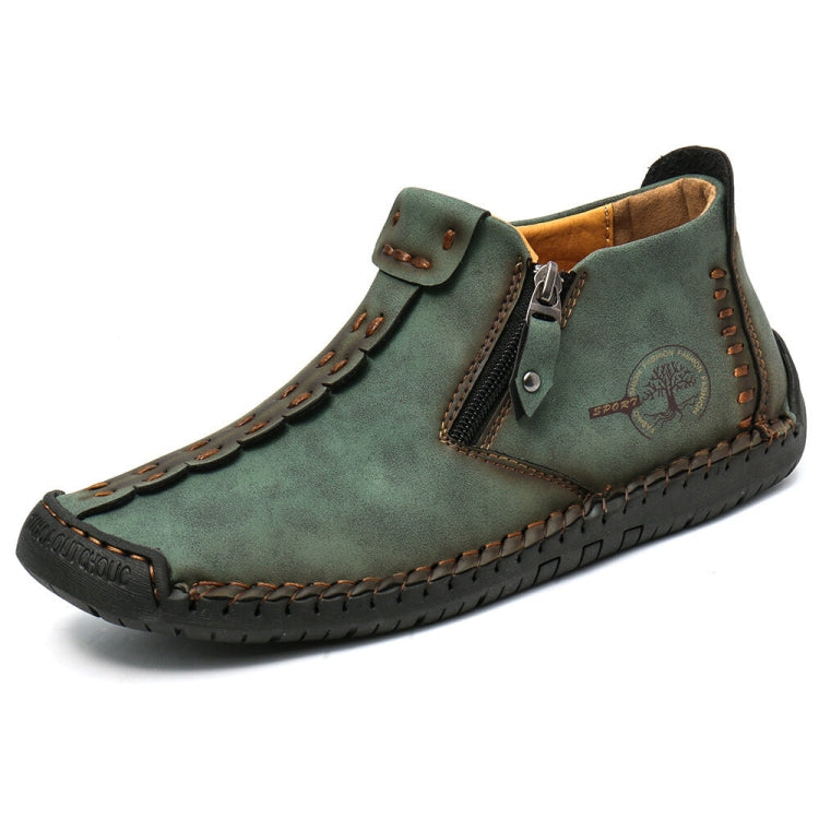 Men’s dark green suede ankle boots with side zipper, buckled strap, and stitched trim