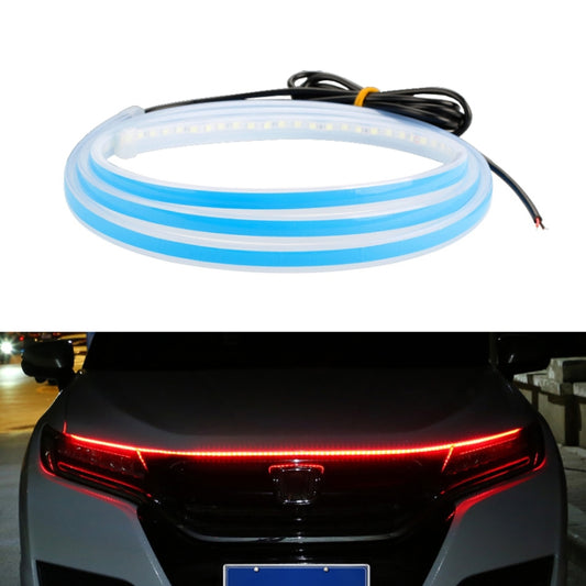 Car LED hood streamer light strip emitting blue light along the front edge