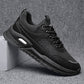 Black height-increasing running shoes with lace-up closure, sculpted midsole, air window