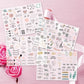 Wedding planning sticker pack with multiple sheets showing hearts, greenery, and love phrases