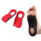 Red bow-support insole pair shown with heel cup opening and small vent holes