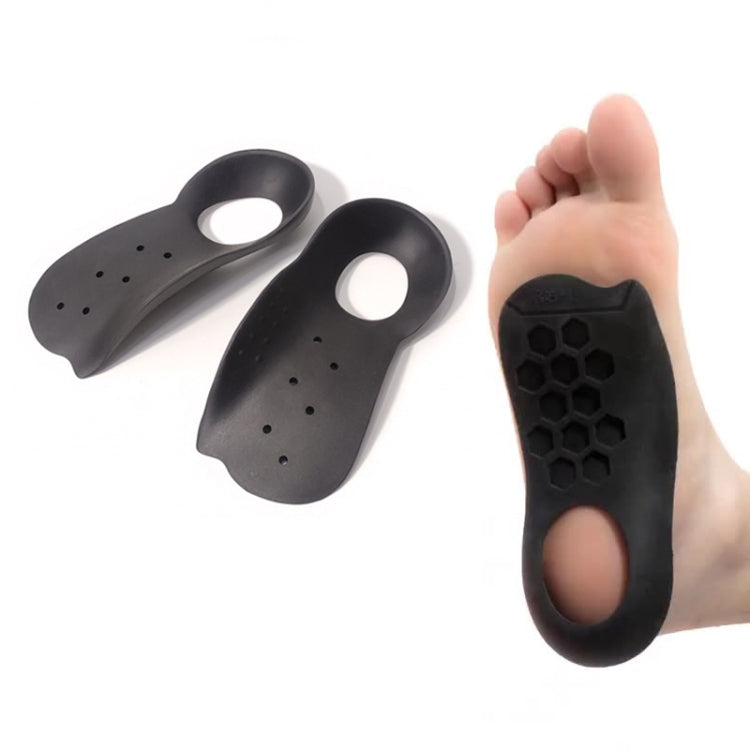 Black sports insole pair with perforations and textured arch for support
