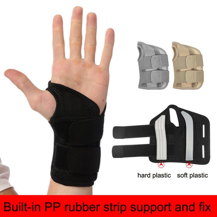 Black wrist brace on hand with built-in support strips and two wrap straps