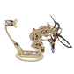 Mechanical hummingbird puzzle model, tan gears with dark legs and red wing accents