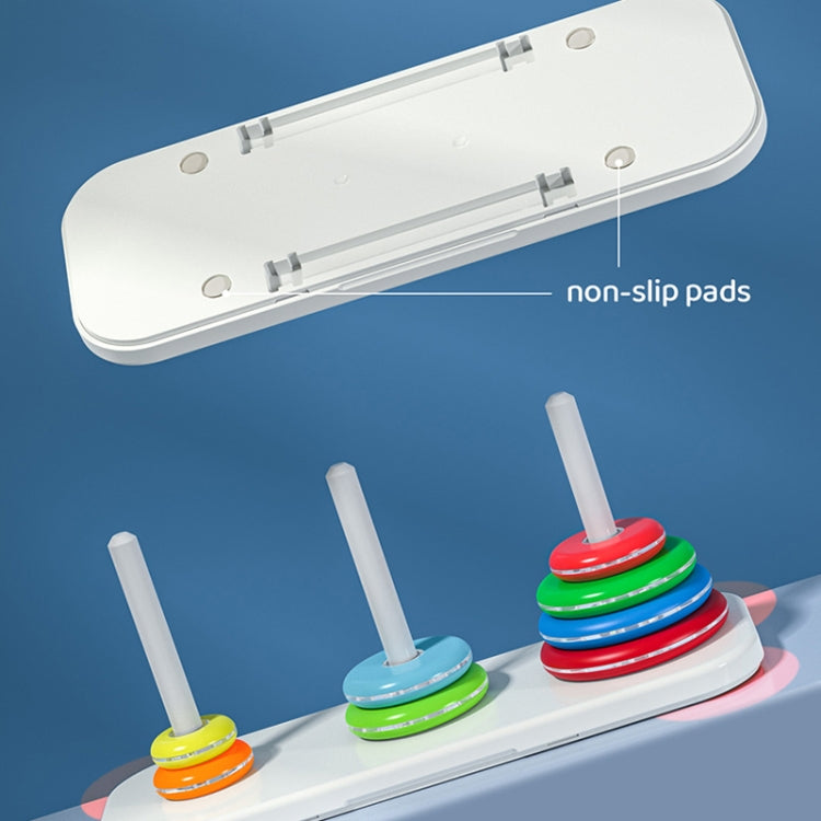 Tower of Hanoi stacking toy parts with rods, base, and colorful ring discs