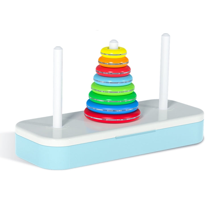 Rainbow Tower of Hanoi stacking toy with tall white rods and multicolor ring discs on base