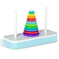 Rainbow Tower of Hanoi stacking toy with white rods and stacked multicolor rings on base