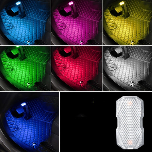 Car interior floor mat with multi-color ambient LED glow, showing textured panel lighting