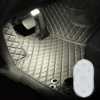 Car LED reading light, oval shape, white LED panel on a vehicle footwell