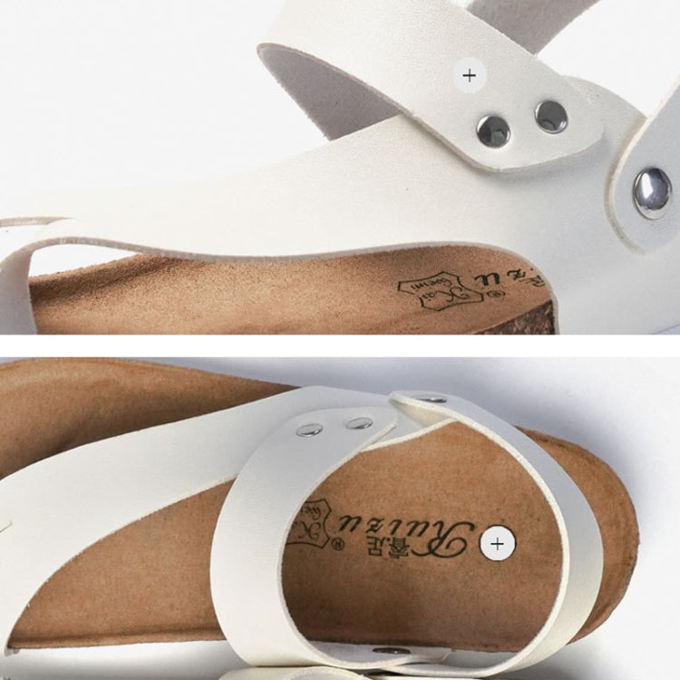 Close-up of white leather cork footbed sandal with embossed logo