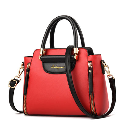 Ladies contrast PU handbag in red with black top flap and gold-tone hardware