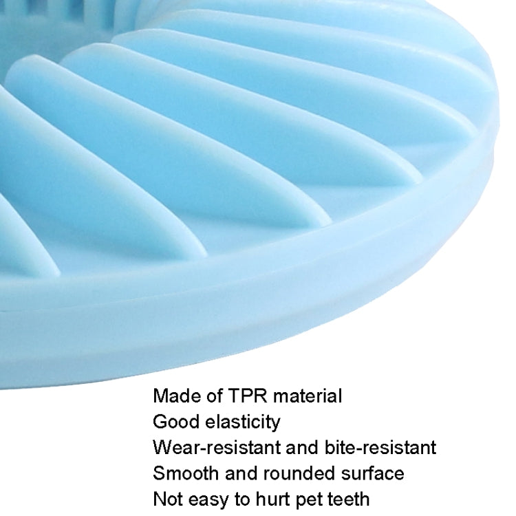 Close-up of blue ridged dog food puzzle toy with smooth rounded edges