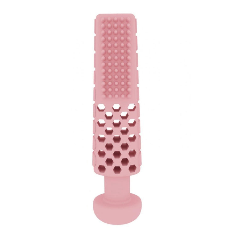 Pink toothpaste-shaped dog teething bite toy with raised cleaning bumps on TPR