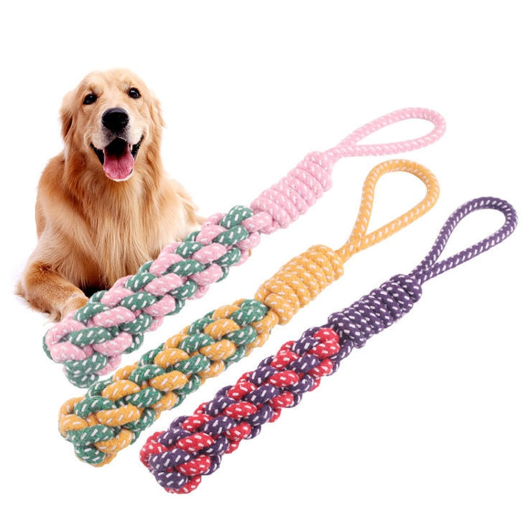 Three braided cotton rope dog chew toys with loop handles, pink, orange, and purple colors.