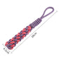Purple and red braided cotton rope dog chew toy with loop handle.