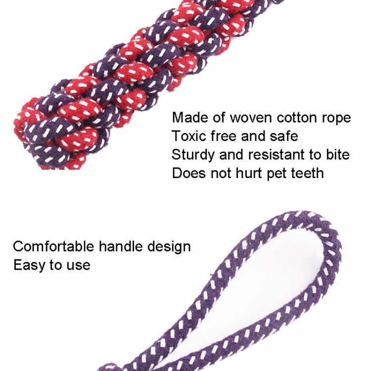 Braided cotton rope dog chew toy with dark purple loop handle and red-white knots.
