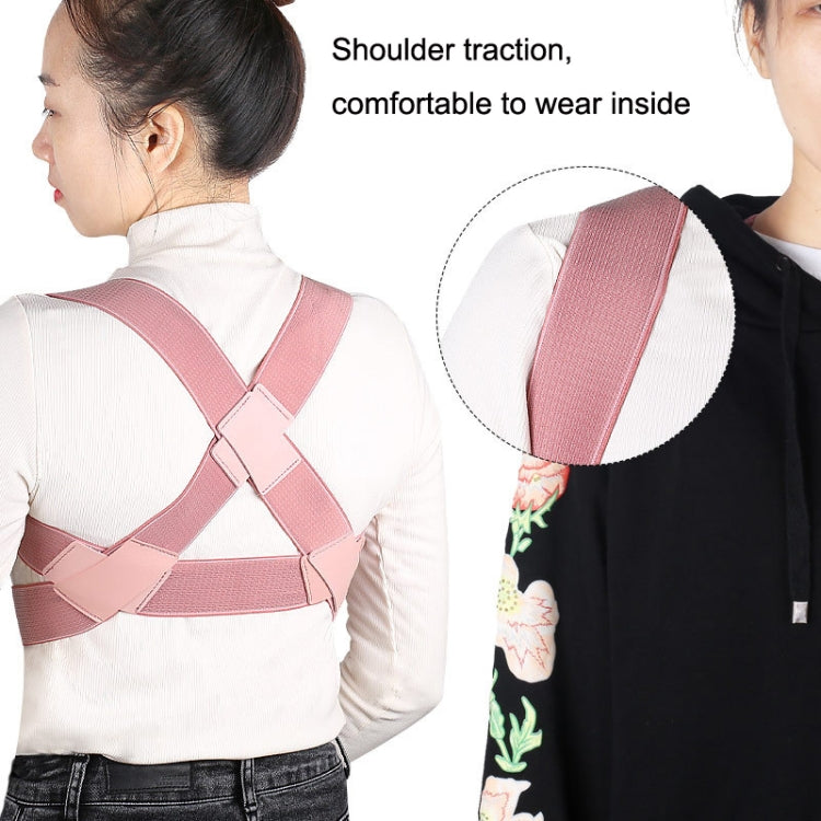 Pink posture correction belt with crisscross back straps worn under clothing