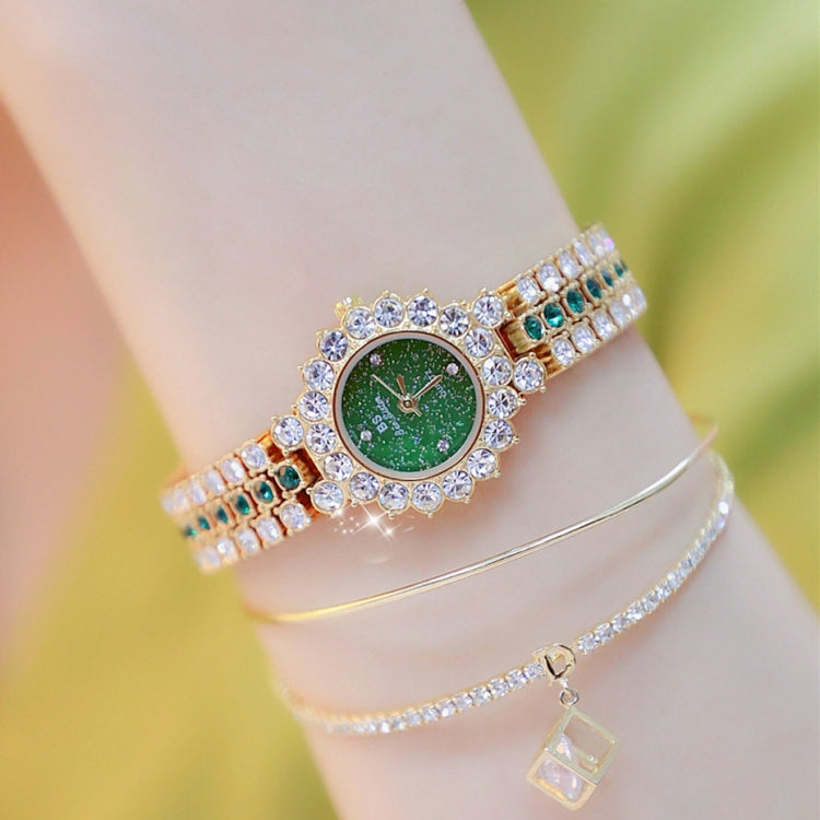 Women’s sparkling rhinestone chain watch with green dial and gold-tone bracelet