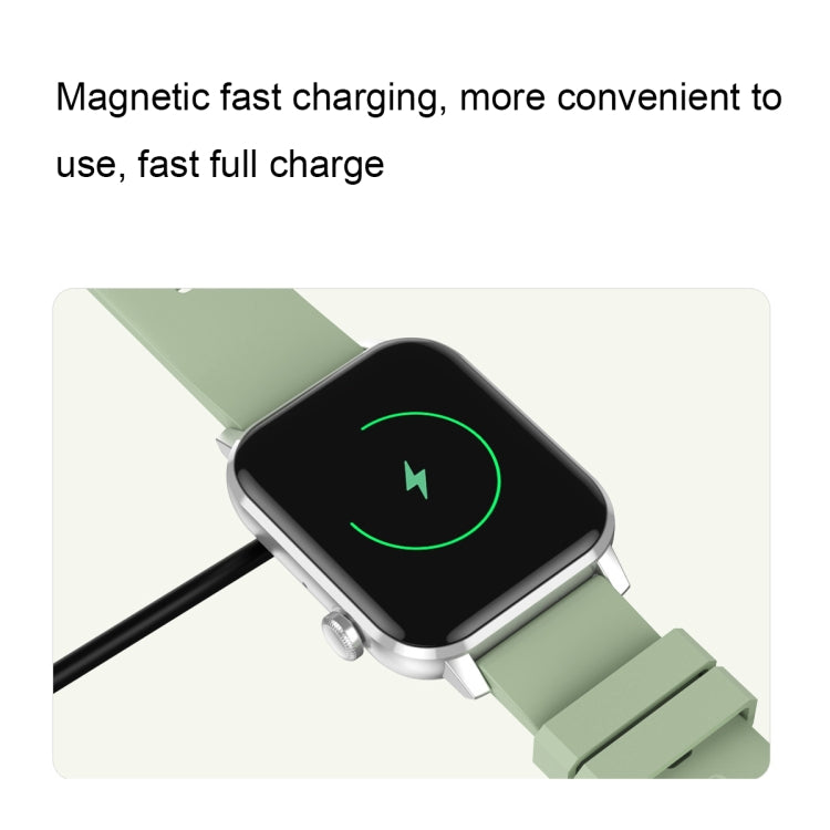 Smartwatch on green silicone strap with magnetic cable charging indicator