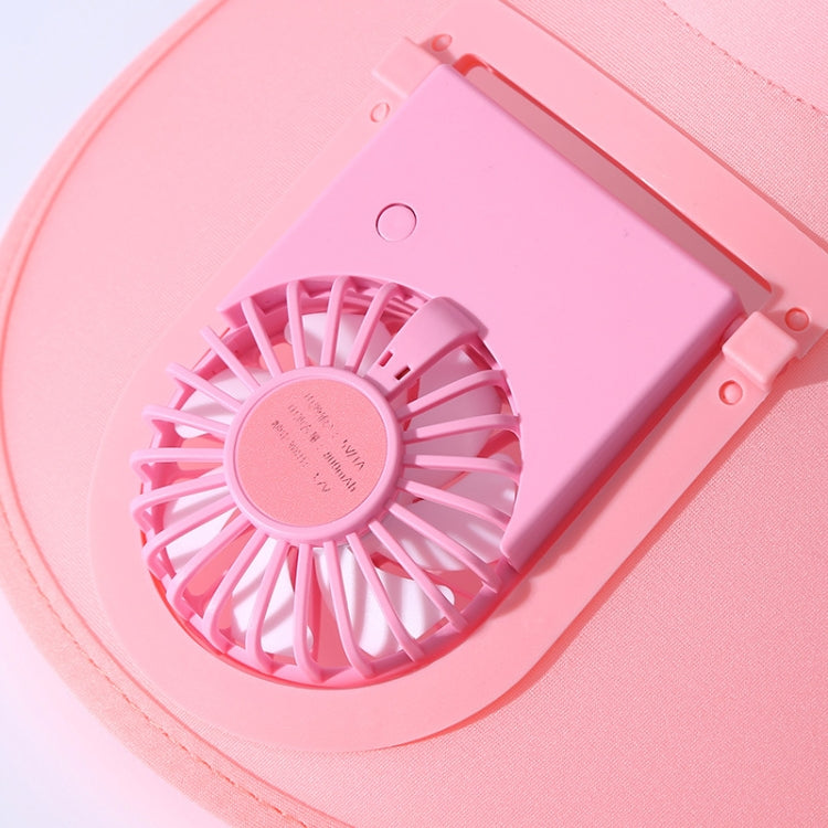 Close-up pink sunshade fan hat showing built-in fan grille inside the brim