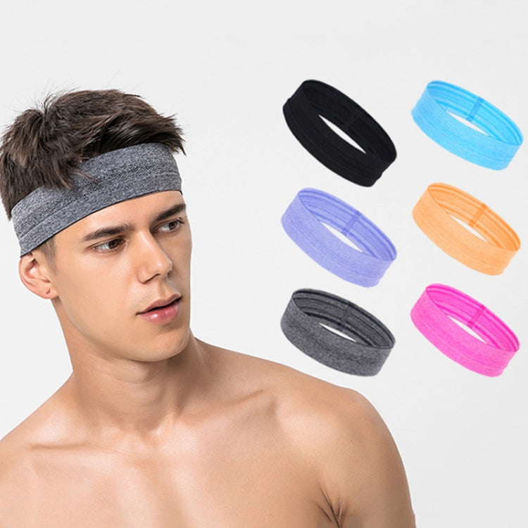 Gray sweat guide headband with blue stripe, worn on model’s head.