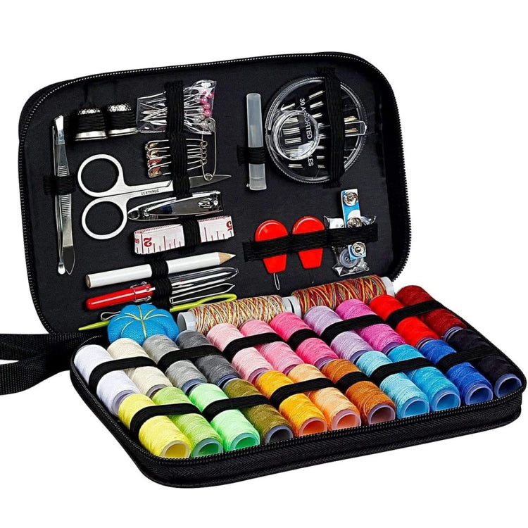 Portable sewing kit case with colorful thread spools and metal sewing tools