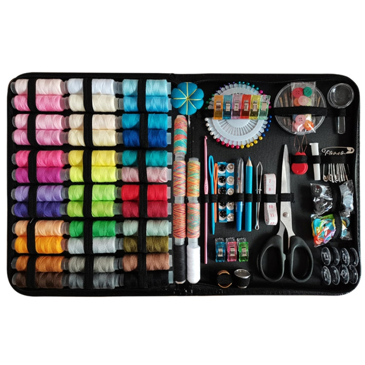 Black portable sewing box set with colorful thread spools, needles, scissors, and tools